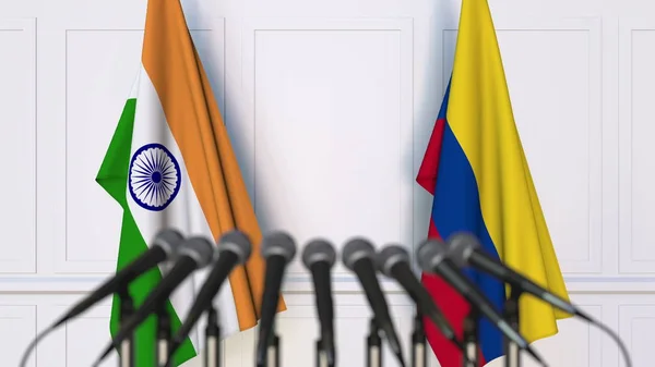 Флаги Индии и Колумбии на международной встрече или конференции. 3D рендеринг — стоковое фото