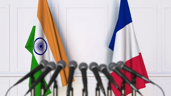 Flags of India and France at international meeting or conference. 3D rendering — Stock Photo, Image