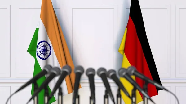 Vlajky z Indie a Německo na mezinárodním setkání nebo konference. 3D vykreslování — Stock fotografie