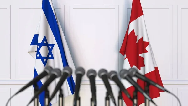 Drapeaux d'Israël et du Canada à une réunion ou conférence internationale. rendu 3D — Photo