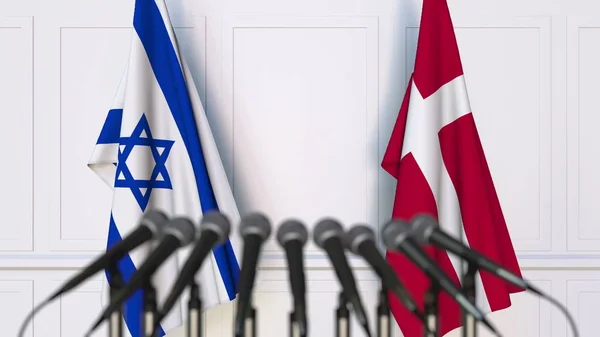 Flaggor av Israel och Danmark på internationellt möte eller konferens. 3D-rendering — Stockfoto