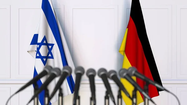 Drapeaux d'Israël et d'Allemagne lors d'une réunion ou d'une conférence internationale. rendu 3D — Photo