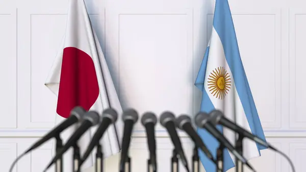 국제 회의 또는 회의에서 일본과 아르헨티나의 플래그입니다. 3 차원 렌더링 — 스톡 사진
