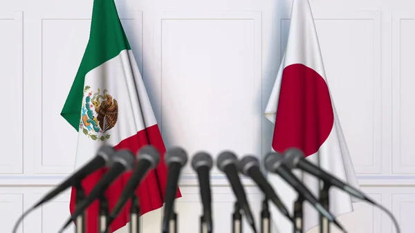 Banderas de México y Japón en reunión o conferencia internacional. Renderizado 3D —  Fotos de Stock