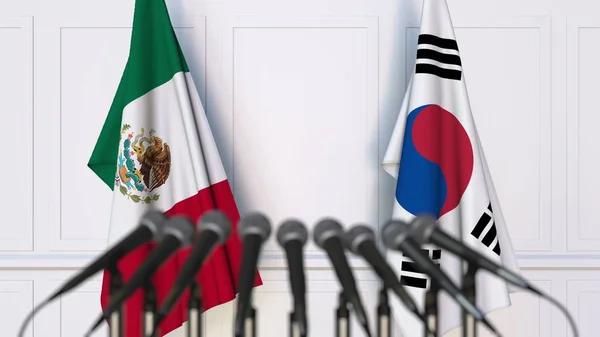 Banderas de México y Corea en reunión o conferencia internacional. Renderizado 3D —  Fotos de Stock