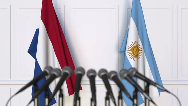 Lijst van vlaggen van Nederland en Argentinië bij internationale vergadering of conferentie. 3D-rendering — Stockfoto