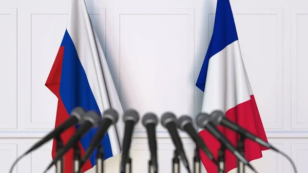 Bandiere della Russia e della Francia in occasione di riunioni o conferenze internazionali. Rendering 3D — Foto Stock