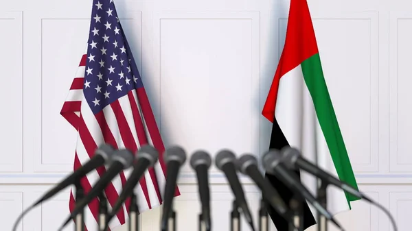 Флаги США и ОАЭ на международной встрече или конференции. 3D рендеринг — стоковое фото