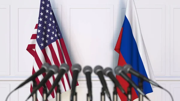 Bandeiras dos EUA e da Rússia em reunião ou conferência internacional. Renderização 3D — Fotografia de Stock