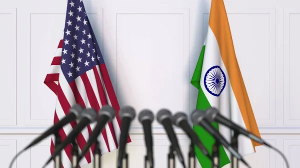 Flags of the USA and India at international meeting or conference. 3D rendering — Stock Photo, Image