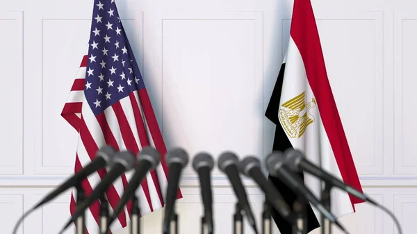 Drapeaux des États-Unis et de l'Égypte lors d'une réunion ou conférence internationale. rendu 3D — Photo