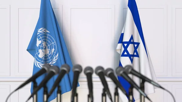 Drapeaux des Nations Unies et d'Israël lors d'une réunion ou d'une conférence internationale. Editorial rendu 3D — Photo