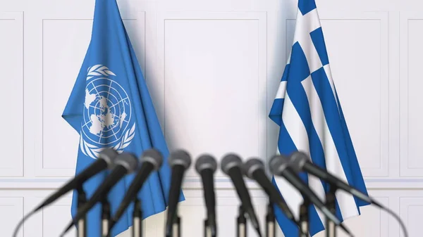 Flaggor av Förenta nationerna och Grekland på internationellt möte eller konferens. Redaktionella 3d-rendering — Stockfoto