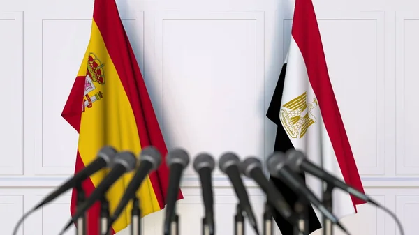 西班牙和埃及在国际会议或会议上的旗帜。3d 渲染 — 图库照片