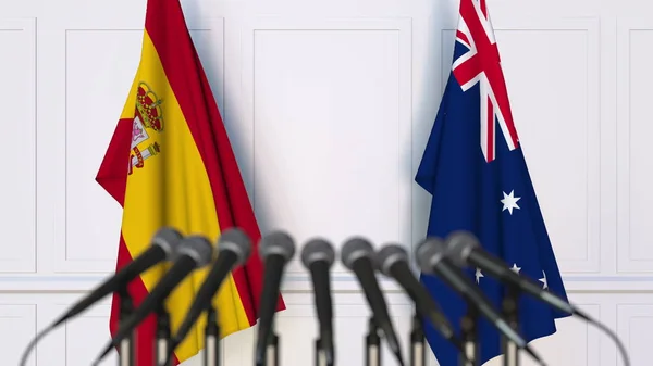 Bandeiras da Espanha e Austrália em reunião ou conferência internacional. Renderização 3D — Fotografia de Stock