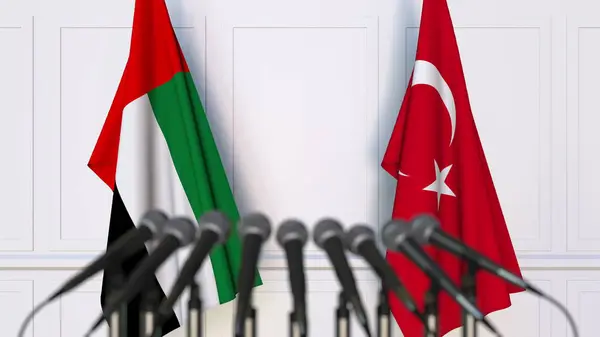 Flags of the UAE and Turkey at international meeting or conference. 3D rendering — Stock Photo, Image