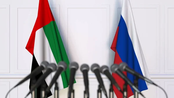 Флаги ОАЭ и России на международной встрече или конференции. 3D рендеринг — стоковое фото