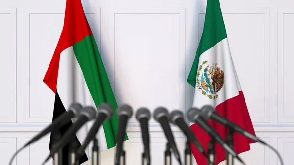 Flags of the UAE and Mexico at international meeting or conference. 3D rendering — Stock Photo, Image