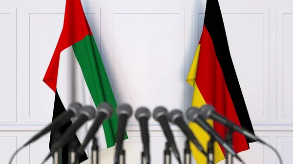 Flags of the UAE and Germany at international meeting or conference. 3D rendering — Stock Photo, Image