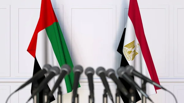 Flags of the UAE and Egypt at international meeting or conference. 3D rendering — Stock Photo, Image