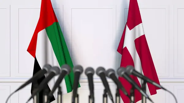 Флаги ОАЭ и Дании на международной встрече или конференции. 3D рендеринг — стоковое фото
