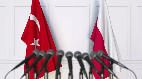 Flaggen der Türkei und Polens bei internationalen Treffen oder Konferenzen. 3D-Darstellung — Stockfoto