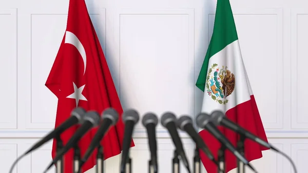 国際会議または会議でトルコ、メキシコの国旗。3 d レンダリング — ストック写真