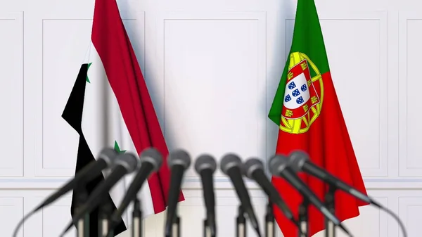 Флаги Сирии и Португалии на международной встрече или конференции. 3D рендеринг — стоковое фото