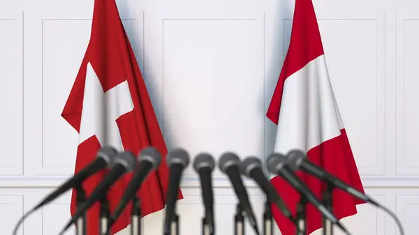 Flaggen der Schweiz und Perus bei internationalen Treffen oder Konferenzen. 3D-Darstellung — Stockfoto