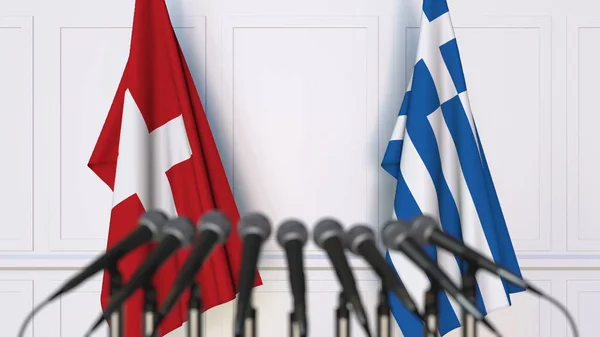 Σημαίες της Ελβετίας και της Ελλάδας στο διεθνή σύσκεψη ή διάσκεψη. 3D rendering — Φωτογραφία Αρχείου