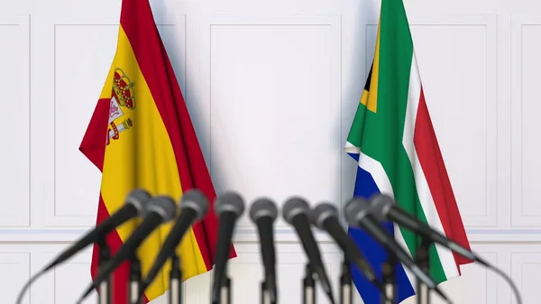 Bandeiras da Espanha e África do Sul em reunião ou conferência internacional. Renderização 3D — Fotografia de Stock