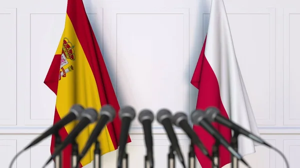 Bandiere di Spagna e Polonia in occasione di riunioni o conferenze internazionali. Rendering 3D — Foto Stock