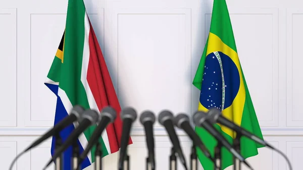 Lijst van vlaggen van Zuid-Afrika en Brazilië bij internationale vergadering of conferentie. 3D-rendering — Stockfoto