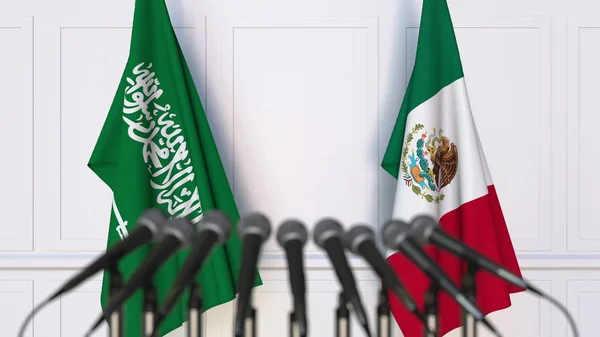 Banderas de Arabia Saudita y México en reunión o conferencia internacional. Renderizado 3D —  Fotos de Stock