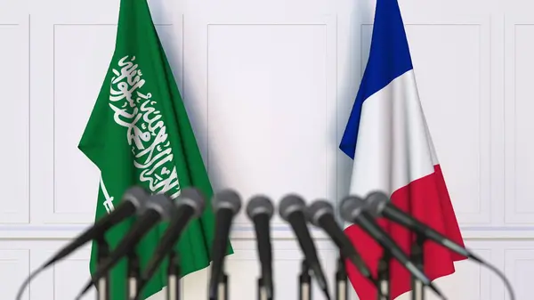 沙特阿拉伯和法国在国际会议或会议上的旗帜。3d 渲染 — 图库照片