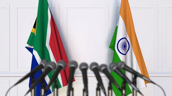 Flags of South Africa and India at international meeting or conference. 3D rendering — Stock Photo, Image