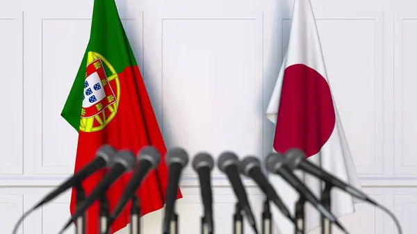 Σημαίες της Πορτογαλίας και της Ιαπωνίας στο διεθνή σύσκεψη ή διάσκεψη. 3D rendering — Φωτογραφία Αρχείου