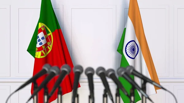 Flags of Portugal and India at international meeting or conference. 3D rendering — Stock Photo, Image