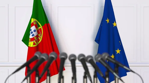 Σημαίες της Πορτογαλίας και της Ευρωπαϊκής Ένωσης στο διεθνή σύσκεψη ή διάσκεψη. 3D rendering — Φωτογραφία Αρχείου
