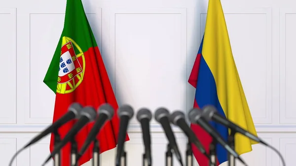 Flaggen Portugals und Kolumbiens bei internationalen Treffen oder Konferenzen. 3D-Darstellung — Stockfoto