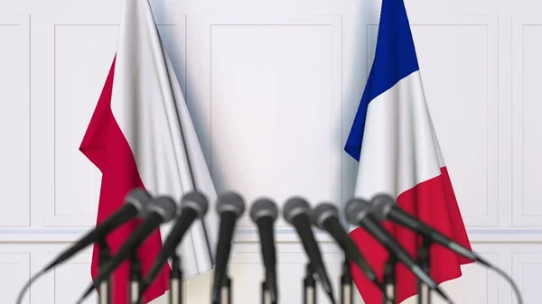 Σημαίες της Πολωνίας και της Γαλλίας στο διεθνή σύσκεψη ή διάσκεψη. 3D rendering — Φωτογραφία Αρχείου