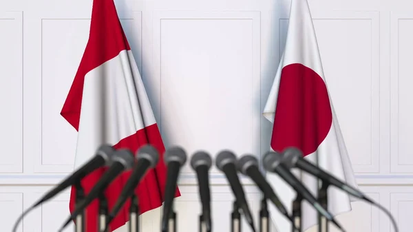 Bandeiras do Peru e do Japão em reunião ou conferência internacional. Renderização 3D — Fotografia de Stock