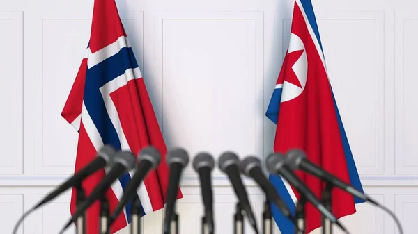 Flaggor i Norge och Nordkorea på internationellt möte eller konferens. 3D-rendering — Stockfoto