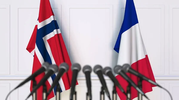 Flaggor i Norge och Frankrike på internationellt möte eller konferens. 3D-rendering — Stockfoto