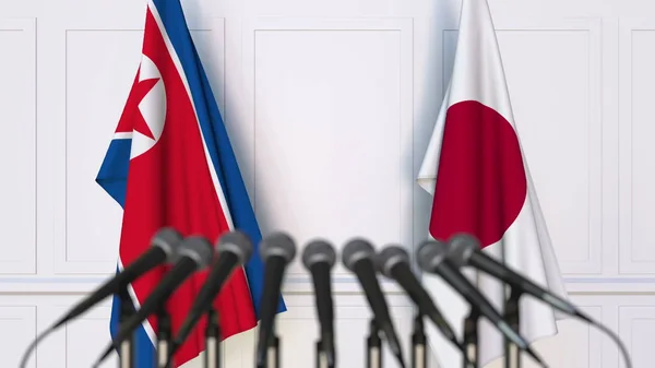 Lijst van vlaggen van Noord-Korea en Japan op internationale vergadering of conferentie. 3D-rendering — Stockfoto