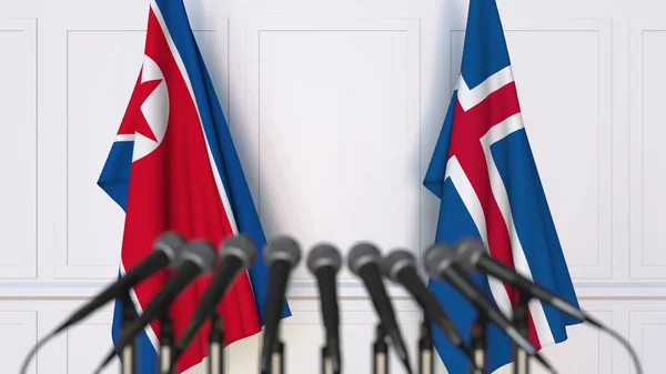 Flaggor av Nordkorea och Island på internationellt möte eller konferens. 3D-rendering — Stockfoto