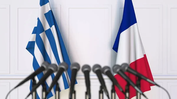 Σημαίες της Ελλάδας και της Γαλλίας στο διεθνή σύσκεψη ή διάσκεψη. 3D rendering — Φωτογραφία Αρχείου