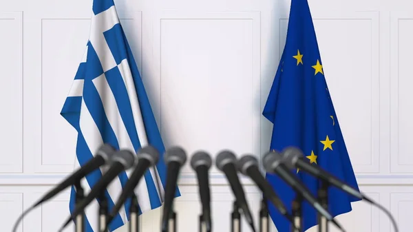 Banderas de Grecia y de la Unión Europea en reuniones o conferencias internacionales. Renderizado 3D — Foto de Stock