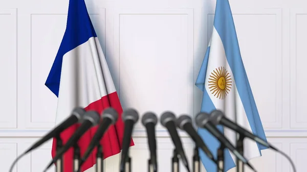 Bandeiras da França e Argentina em reunião ou conferência internacional. Renderização 3D — Fotografia de Stock