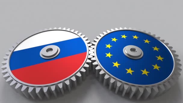 Bandiere della Russia e dell'Unione europea sugli ingranaggi a maglie. Cooperazione internazionale animazione concettuale — Video Stock